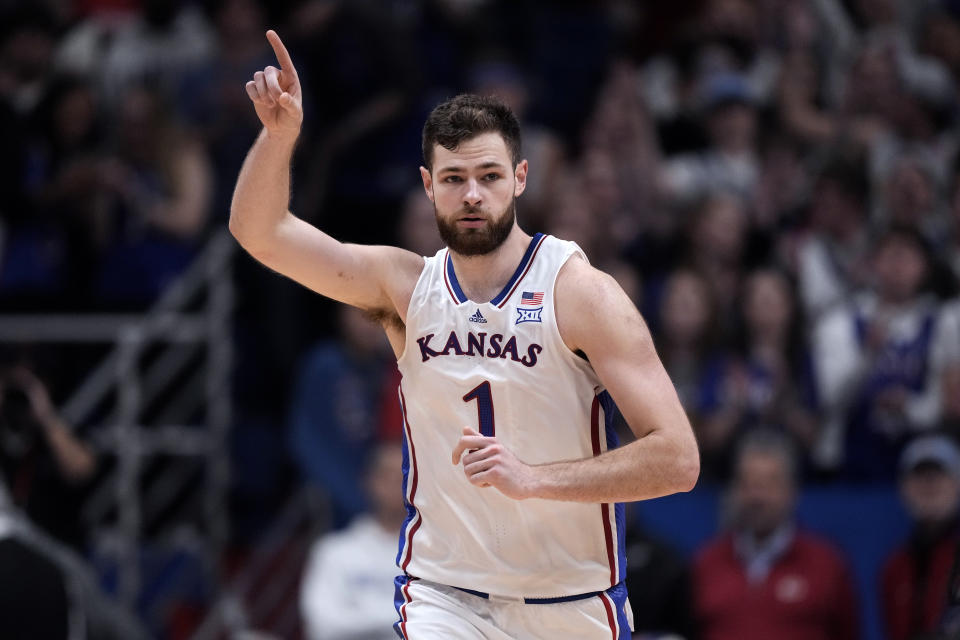 Kansas center Hunter Dickinson celebrates after a basket during the second half of an NCAA college basketball game against Eastern Illinois Tuesday, Nov. 28, 2023, in Lawrence, Kan. Kansas won 71-63. (AP Photo/Charlie Riedel)