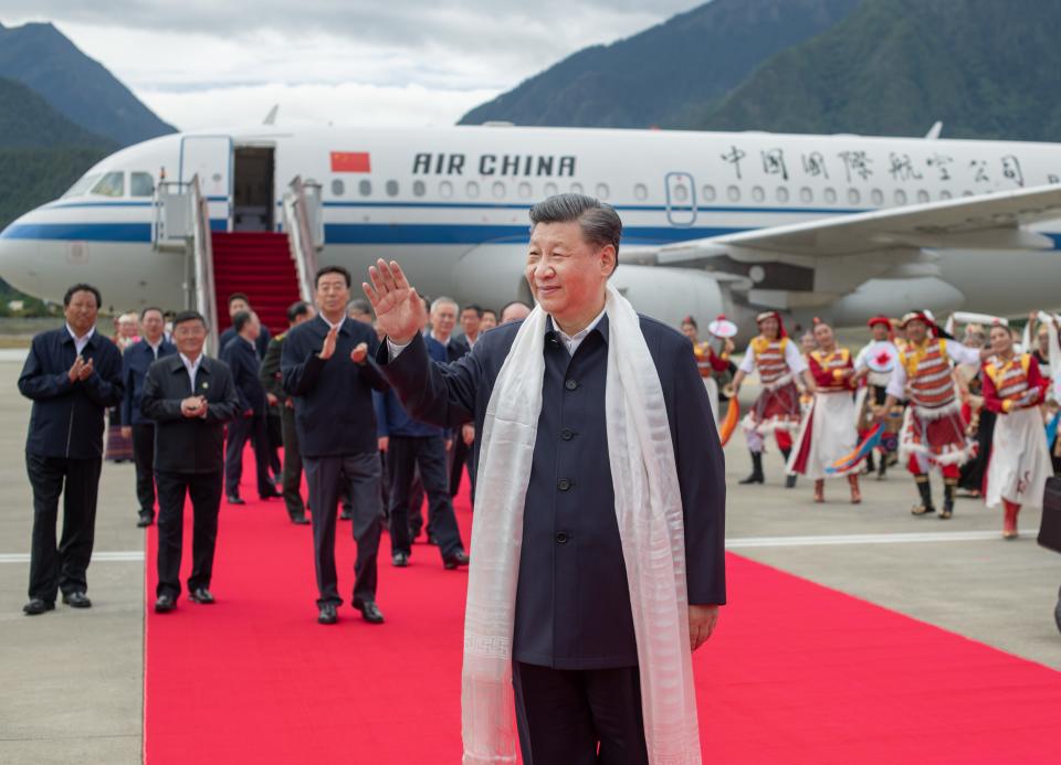 Chinese President Xi Jinping, also general secretary of the Communist Party of China CPC Central Committee and chairman of the Central Military Commission, arrives at the Nyingchi Mainling Airport and is warmly welcomed by local people and officials of various ethnic groups in southwest China's Tibet Autonomous Region, July 21, 2021. Xi visited the Tibet Autonomous Region from Wednesday to Friday. He extended congratulations to the 70th anniversary of Tibet's peaceful liberation and visited officials and ordinary people of various ethnic groups. (Photo by Xie Huanchi/Xinhua via Getty Images)