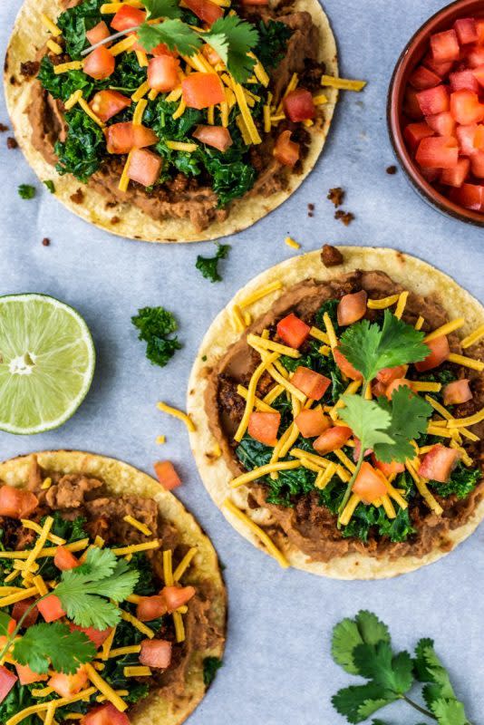 <p>Get a taste of Mexico with these simple plant-based tostadas! They’re full of amazing flavors, including delicious Beyond Meat.</p><p><strong>Get the recipe: <a href="https://thenutfreevegan.net/beyond-meat-tostadas-with-marinated-kale/" rel="nofollow noopener" target="_blank" data-ylk="slk:Beyond Meat Tostadas with Marinated Kale;elm:context_link;itc:0;sec:content-canvas" class="link "><em>Beyond Meat Tostadas with Marinated Kale</em></a></strong></p>