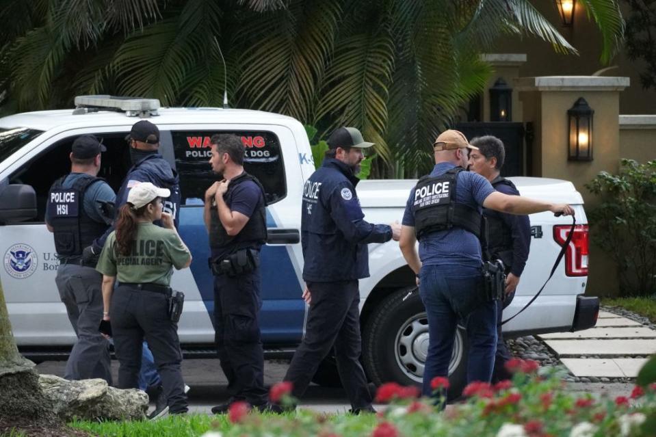 Feds outside of Diddy’s home in Florida. MEGA