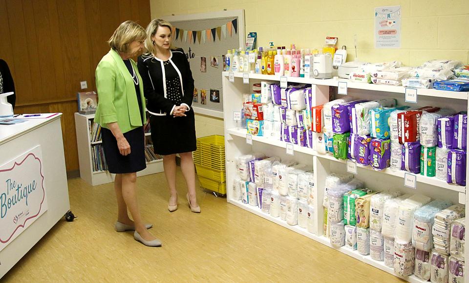 Ohio First Lady Fran DeWine in April tours Ashland Pregnancy Center's The Boutique housed in Emmanuel Methodist Church with the center's Executive Director Melanie Miller. The Boutique provides infant clothes, diapers, food, and other maternity and infant supplies to expectant and new mothers.