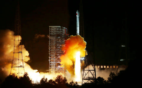 Space watchers believe China aims to land a man on the moon sometime after 2030  - Credit: Reuters