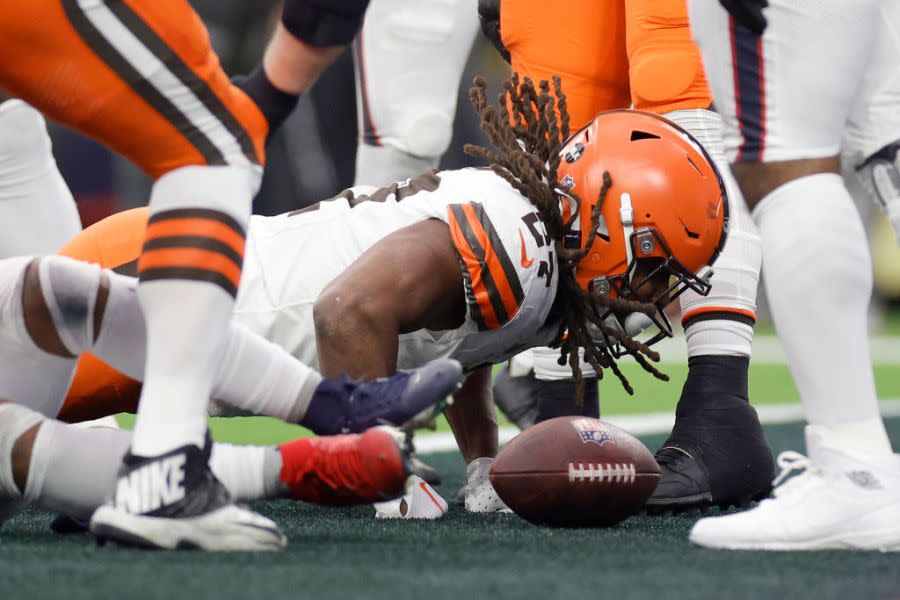 HOUSTON, TEXAS – JANUARY 13: Kareem Hunt #27 of the Cleveland Browns celebrates after scoring a touchdown against the Houston Texans during the first quarter in the AFC Wild Card Playoffs at NRG Stadium on January 13, 2024 in Houston, Texas. (Photo by Carmen Mandato/Getty Images)