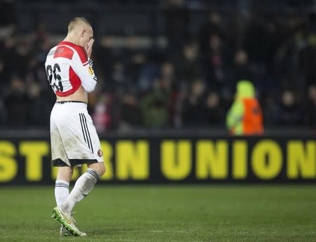 Rick Karsdorp of Feyenoord reacts after losing their Europa League round of 32 second leg soccer match against AS Roma at the Kuip stadium in Rotterdam February 26, 2015. REUTERS/Michael Kooren