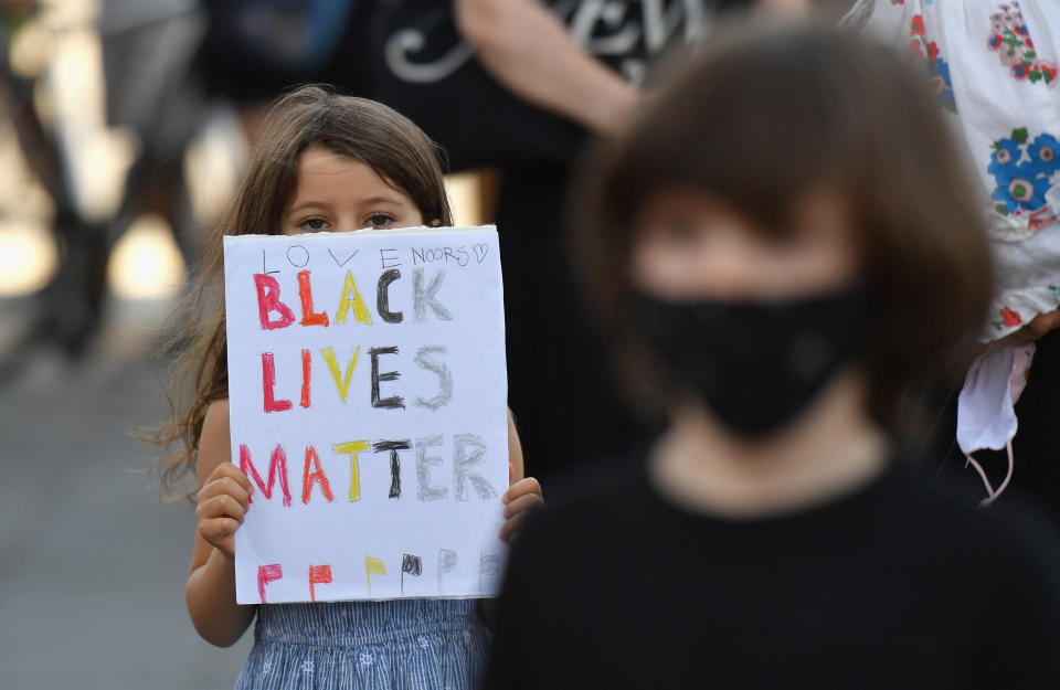 Families participate in a children's march in solidarity with the Black Lives Matter movement and national protests against police brutality on June 9, 2020 in the Brooklyn Borough of New York City. - George Floyd will be laid to rest Tuesday in his Houston hometown, the culmination of a long farewell to the 46-year-old African American whose death in custody ignited global protests against police brutality and racism.Thousands of well-wishers filed past Floyd's coffin in a public viewing a day earlier, as a court set bail at $1 million for the white officer charged with his murder last month in Minneapolis. (Photo by Angela Weiss / AFP) (Photo by ANGELA WEISS/AFP via Getty Images)