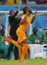 Ivory Coast's Didier Drogba runs onto the field, after replacing Geoffroy Serey Die in a tactical substitution, during their 2014 World Cup Group C soccer match against Japan at the Pernambuco arena in Recife, June 14, 2014. REUTERS/Brian Snyder