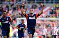 Fulham's Pajtim Kasami celebrates scoring the opening goal of the game