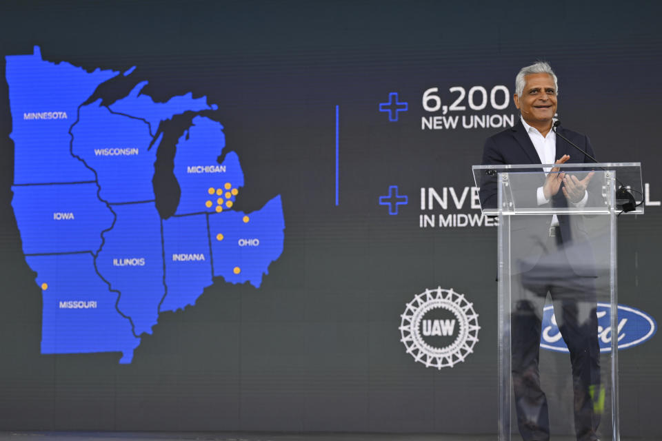 Kumar Galhotra, president of Ford Blue, the company's division that makes internal combustion vehicles, speaks during a press conference, Thursday, June 2, 2022, in Avon Lake, Ohio. Ford announced it will add 6,200 factory jobs in Michigan, Missouri and Ohio as it prepares to build more electric vehicles and roll out two redesigned combustion-engine models. (AP Photo/David Richard)