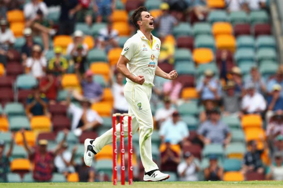 Pat Cummins celebrates the wicket of Ollie Robinson at The Gabba (Getty Images)