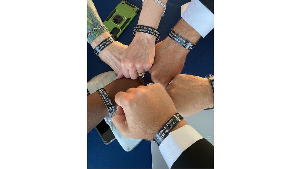 Parsons Corp. employees wear KIA bracelets in honor of Army Staff Sgt. Donna Johnson, a former Parsons instructor killed by a vehicle-borne IED in Afghanistan on Oct. 1, 2012. (Courtesy of Parsons Corp.)