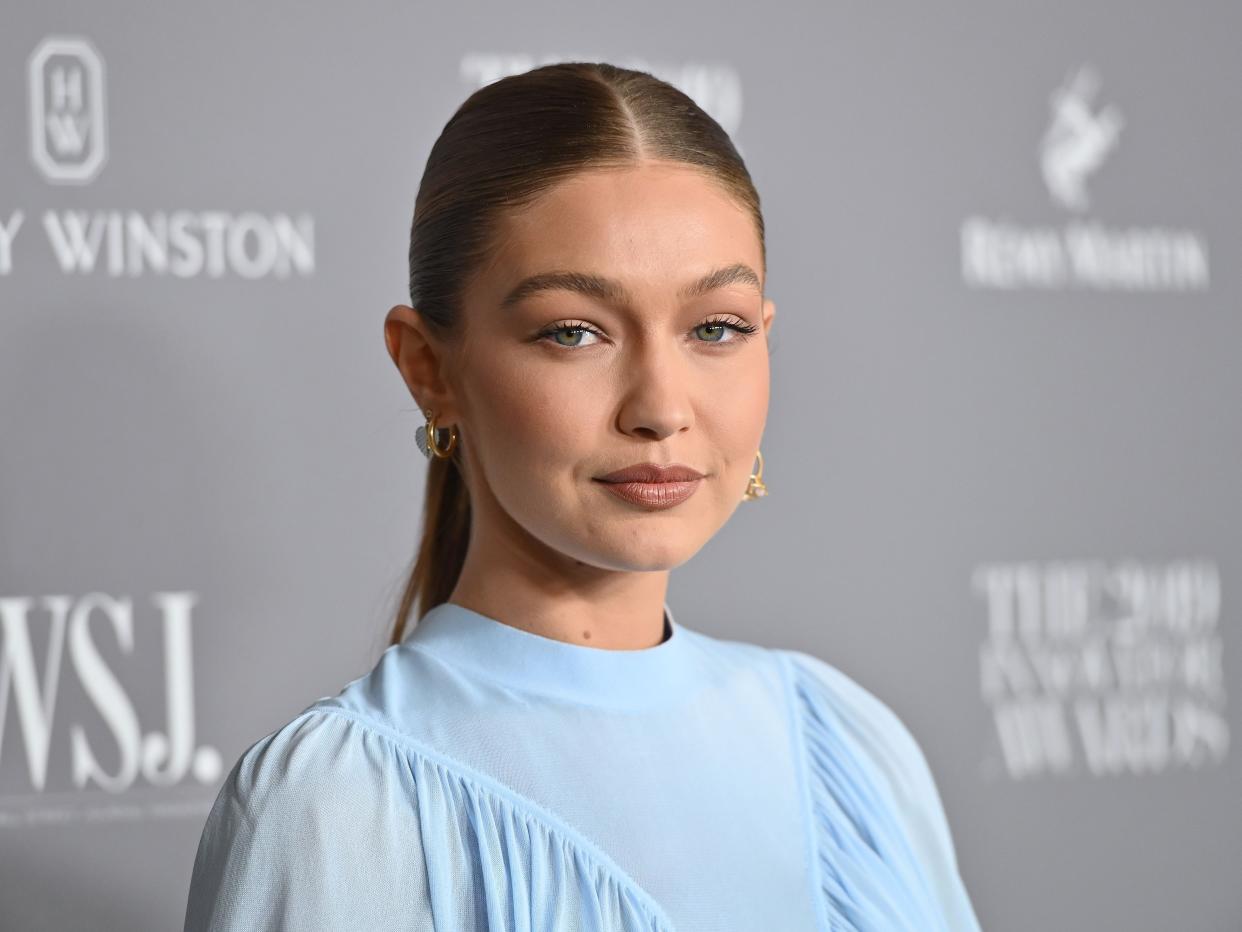 Gigi Hadid said that she voted via absentee ballot with her daughter by her side.