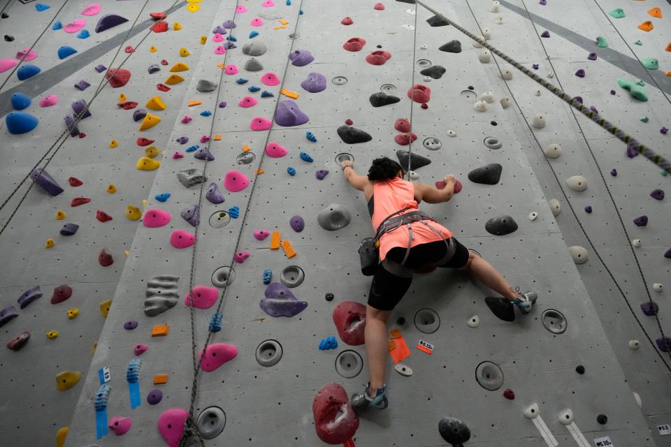 Lisa Montanez, of Jersey City, heads up the wall, during a Brown Girls Climb meeting at the New Jersey Rock Gym, in Fairfield. Thursday, May 18, 2023 