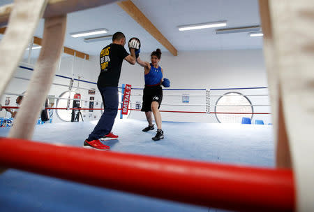 Iranian boxer Sadaf Khadem attends a training session in preparation to her first official boxing bout in Royan, France, April 11, 2019. REUTERS/Regis Duvignau