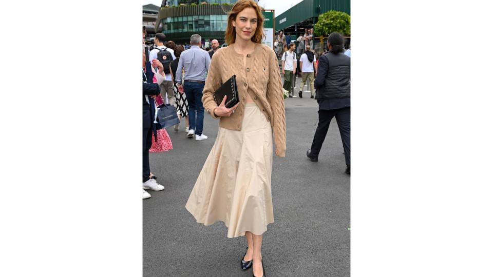  Alexa Chung, wearing Ralph Lauren, attends the Wimbledon Tennis Championships at the All England Tennis and Croquet Club on at Wimbledon on July 10, 2024