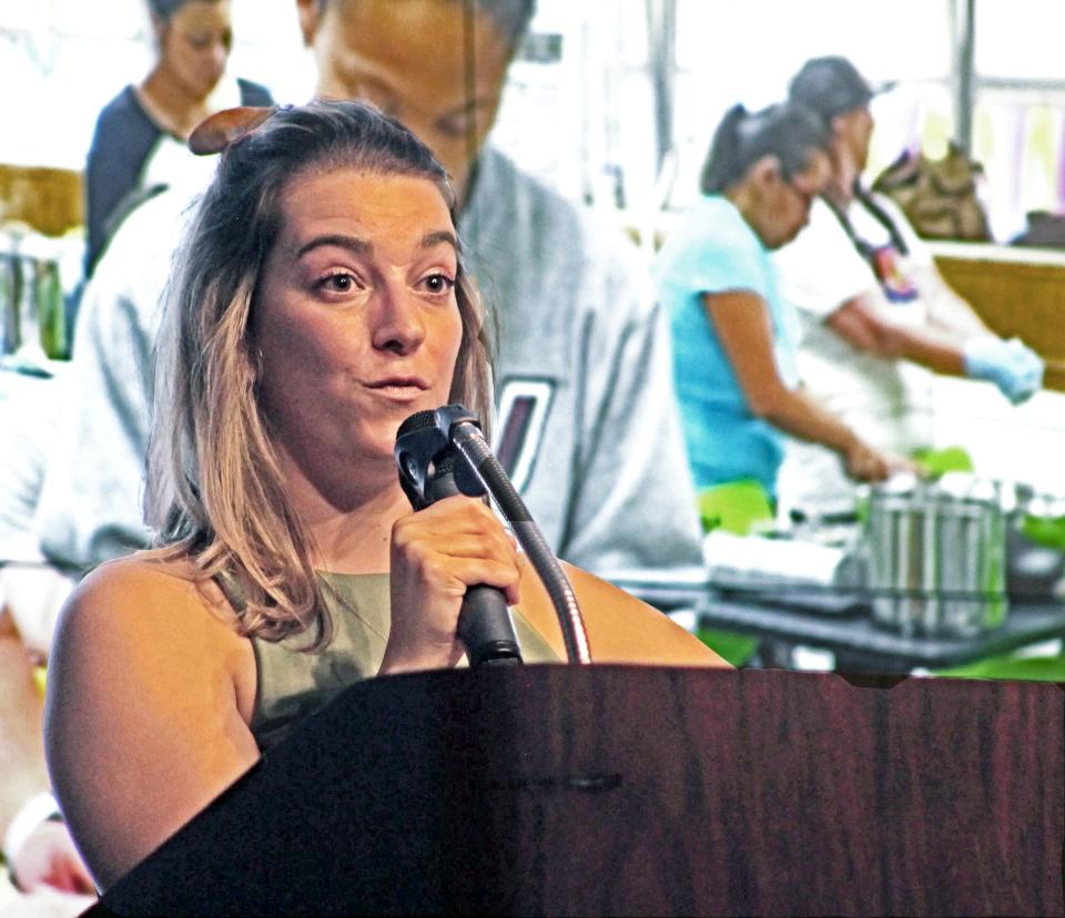 Megan Moore, program manager for Pueblo Food Project, speaks during an awards ceremony at the Sun Soil Water Ag Summit inside Pueblo Community College on Friday, Feb. 23, 2024.