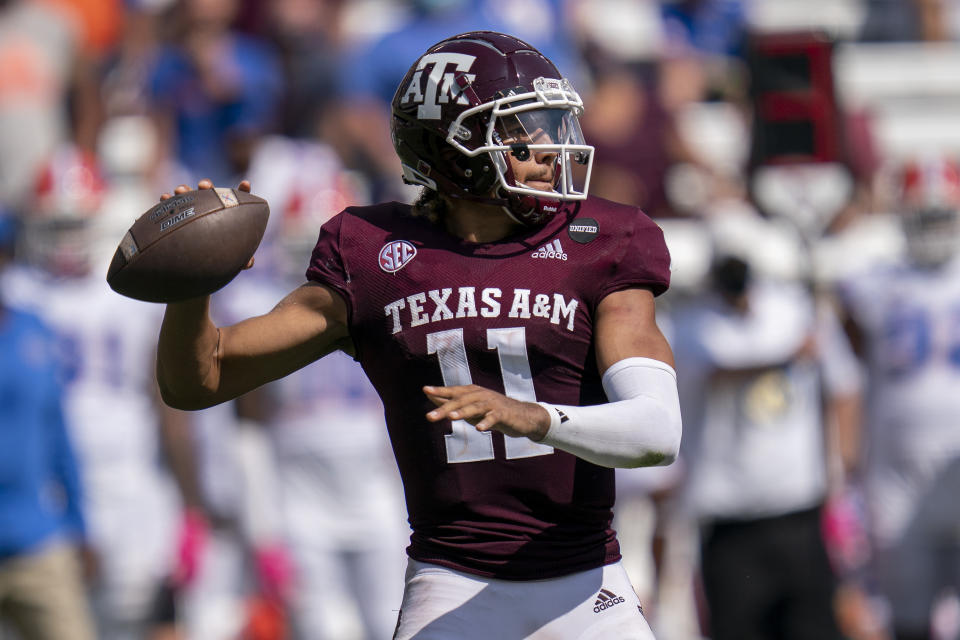 Texas A&M quarterback Kellen Mond (11) passes down field against Florida during the second half of an NCAA college football game, Saturday, Oct. 10, 2020. in College Station, Texas. A rare, four-year starting quarterback in the SEC, Mond has become the program’s all-time passing leader while guiding the seventh-ranked Aggies to a 3-1 start. (AP Photo/Sam Craft)