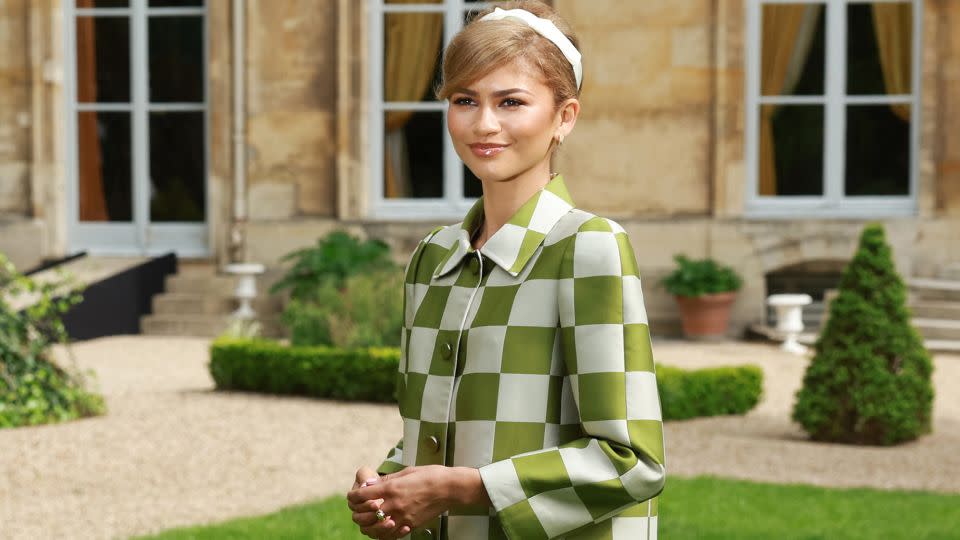 At a press call in Paris on April 6, she opted for more Vuitton — a tailored coat from the label's Spring-Summer 2013 collection, with a sharp checkerboard pattern evoking the geometry of a tennis court's boundaries. - Emmanuel Dunand/AFP/Getty Images