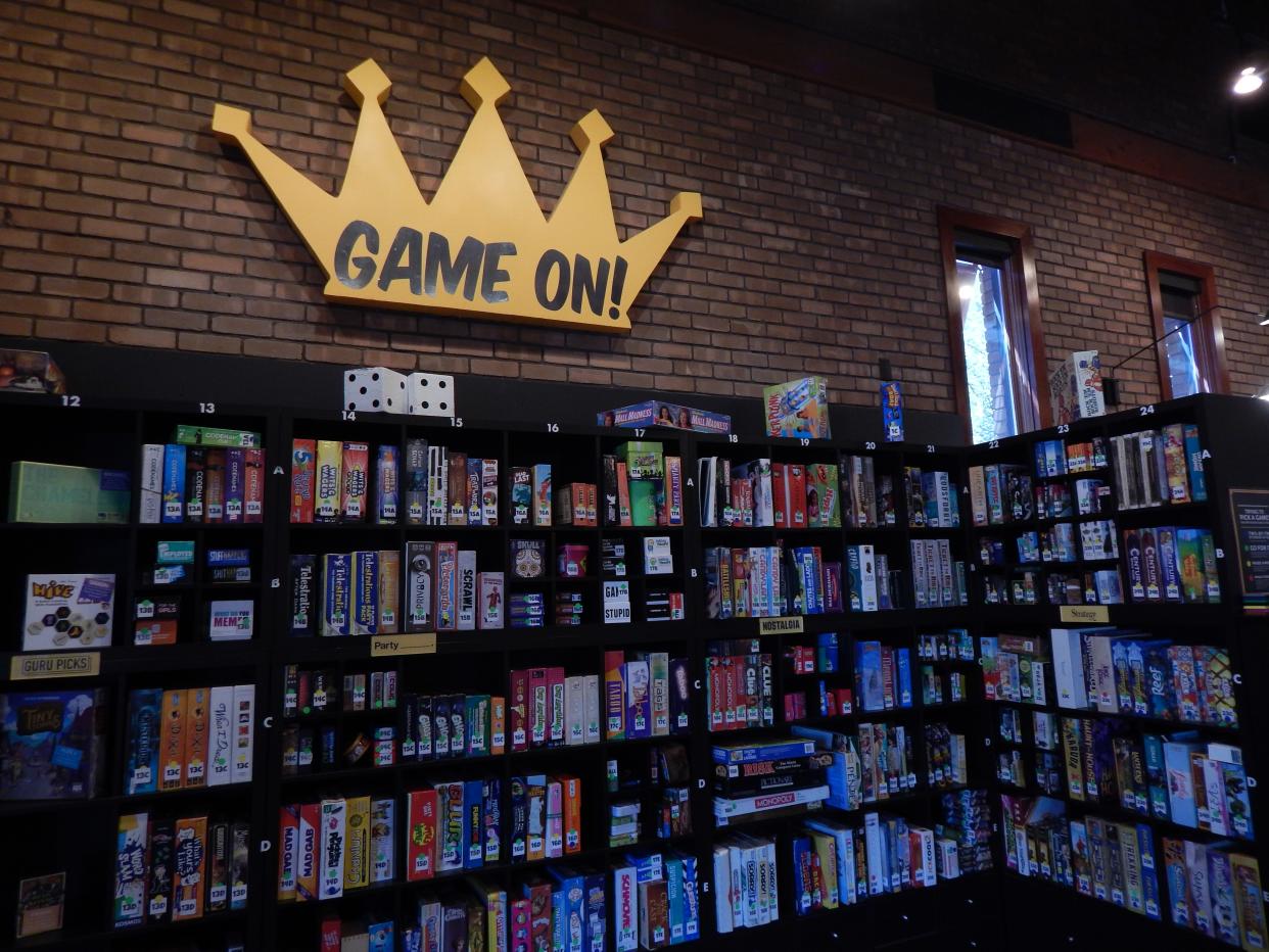 Choose a game from the board game library at Snakes and Lattes on Mill Avenue in Tempe.