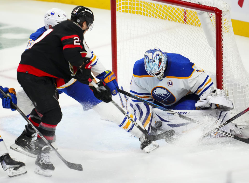 Buffalo Sabres goaltender Ukko-Pekka Luukkonen (1) makes a save against the Ottawa Senators during the third period of an NHL hockey game Tuesday, Oct. 24. 2023, in Ottawa, Ontario. (Sean Kilpatrick/The Canadian Press via AP)