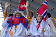 Norwegian climber Kristin Harila, right, and her Nepali sherpa guide Tenjen Sherpa, left, who climbed the world's 14 tallest mountains in record time, arrive in Kathmandu, Nepal, Saturday, Aug. 5, 2023. Harila and Sherpa shattered the record for the fastest climb of the 14 mountains more than 8,000 meters (about 26,000 feet) high when they topped Mount K2 in Pakistan late last month. The previous record was 189 days, and the pair did it in 92 days. (AP Photo/Niranjan Shrestha)