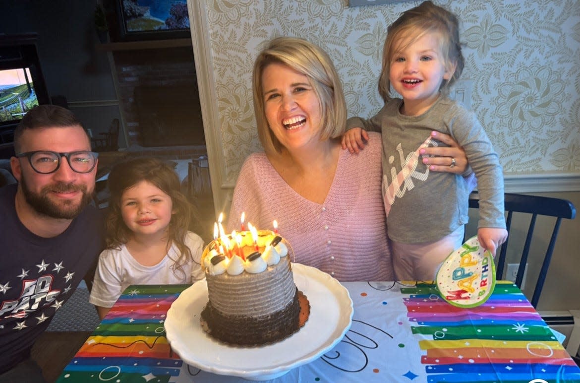 From left: Two-year-old Kit Murdoch of Bridgewater has a rare form of anemia. From left, Kit's dad Sam, Kit's sister Lucy, 5, and Kit's mom Molly.