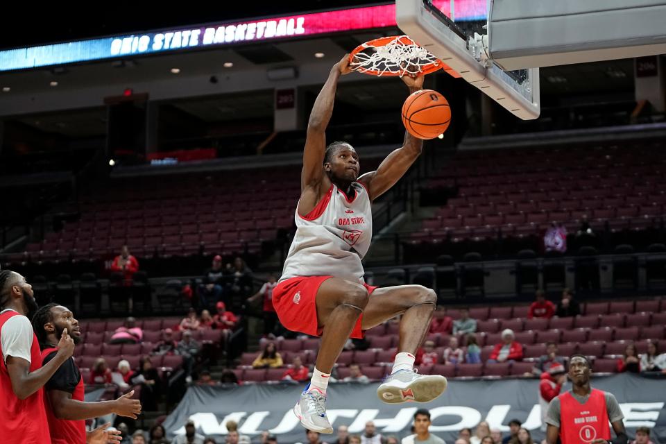 Oct 19, 2023; Columbus, Ohio, USA; Ohio State Buckeyes center Felix Okpara (34) dunks during an open practice at Value City Arena.
