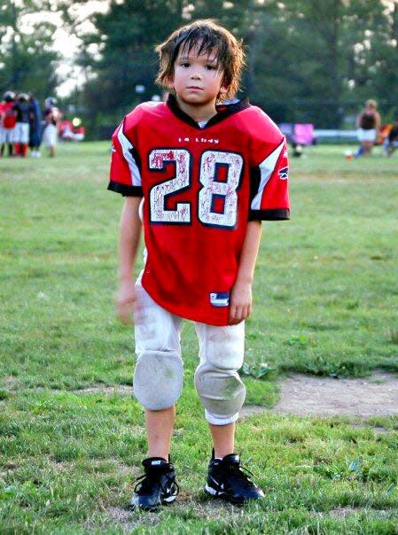 Kien-Tam Elston in an ankle-biter football league in Northern Virginia in 2009.
