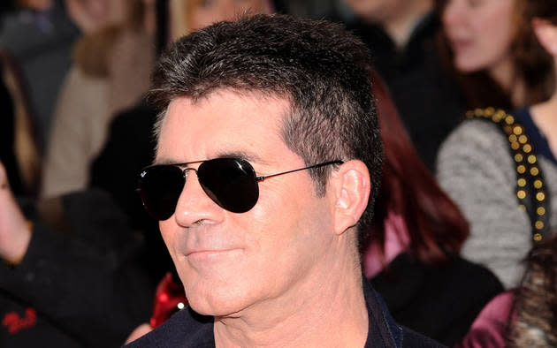 Simon Cowell's glowy skin is down to the miracle product [WENN]