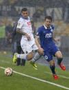 Napoli's Christian Maggio (L) chases Dnipro Dnipropetrovsk's Yevhen Konoplyanka during their Europa League semi-final second leg soccer match at the Olympic stadium in Kiev, Ukraine, May 14, 2015. REUTERS/Valentyn Ogirenko