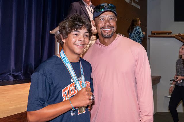 <p>Greg Lovet/The Palm Beach Post/USA Today Network</p> (L-R) Charlie Woods and Tiger Woods