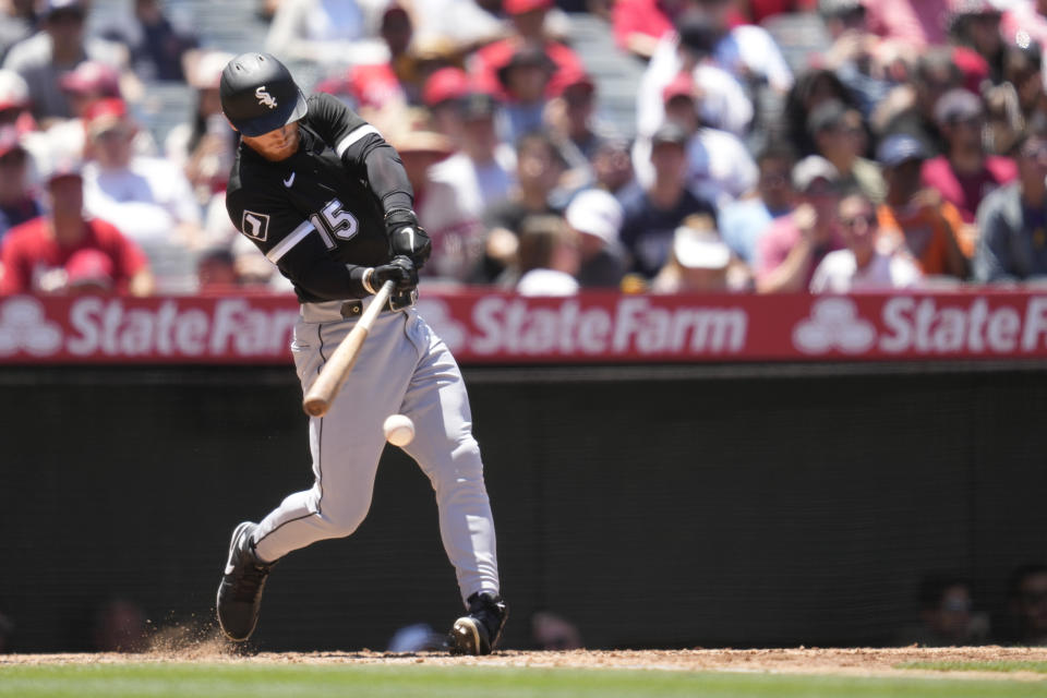 Chicago White Sox's Clint Frazier (15) singles during the third inning of a baseball game against the Los Angeles Angels in Anaheim, Calif., Thursday, June 29, 2023. Eloy Jimenez scored. (AP Photo/Ashley Landis)