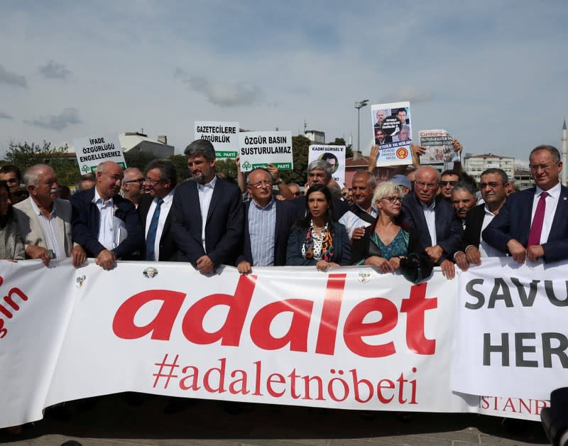 FILE PHOTO: Lawmakers and press freedom activists attend a demonstration in solidarity with the jailed members of the opposition newspaper Cumhuriyet outside a courthouse, in Istanbul