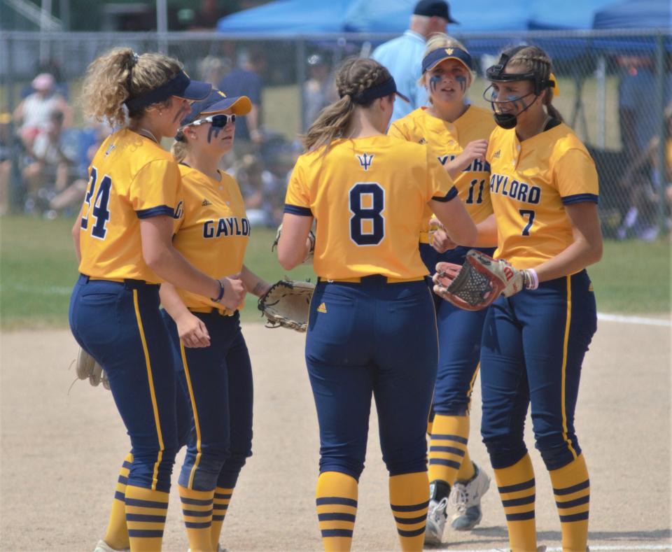 Gaylord celebrates an out during an MHSAA Division 2 district semifinal between Gaylord and Escanaba on Saturday, June 3 in Gaylord, Mich.