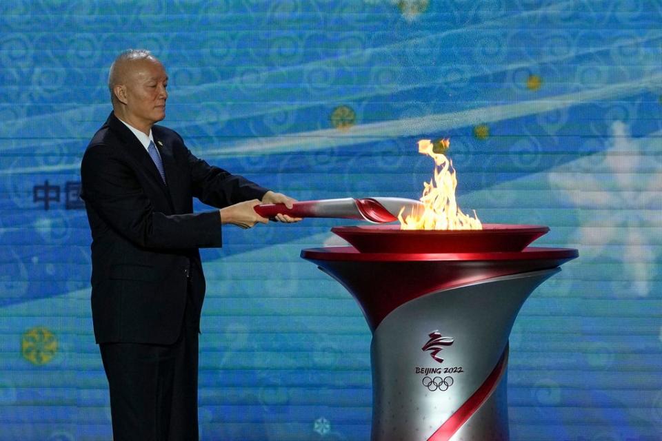 Cai Qi, Beijing Communist Party secretary lights up the Olympic cauldron (AP)