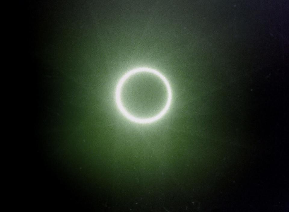 A partial solar eclipse, photographed on film, is shown in Erie on May 10, 1994.