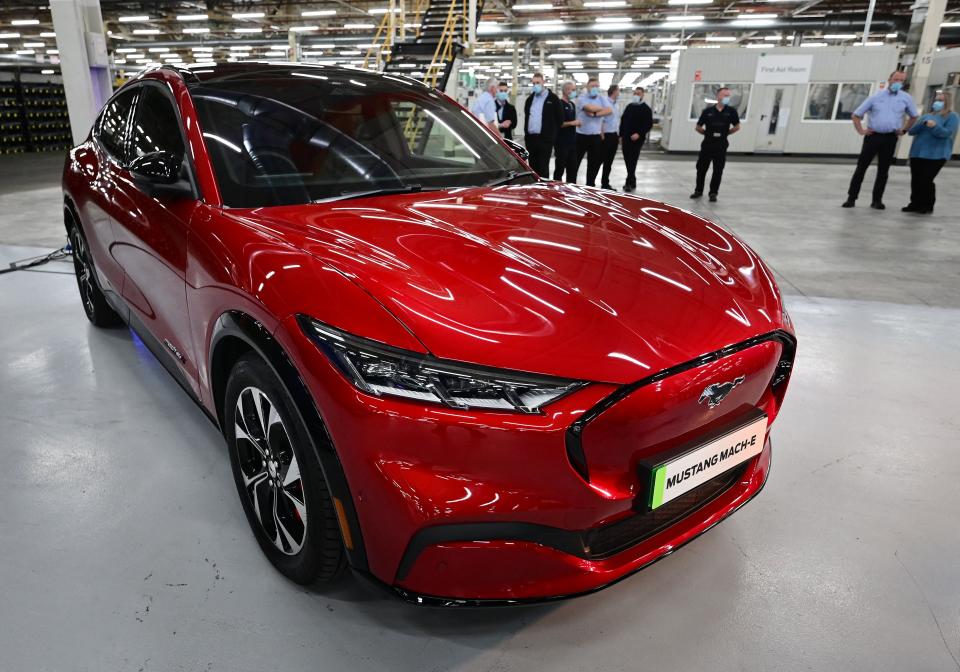 A picture shows the Ford Mustang Mach-E car at Ford's Halewood plant in Liverpool, north west England, on October 18, 2021. - US auto giant Ford on October 18 unveiled plans to convert a UK factory into its first electric vehicle component assembly site in Europe. Ford will invest £230 million ($316 million, 273 million euros) in its Halewood plant on Merseyside in northwest England, the carmaker said. (Photo by Paul ELLIS / AFP) (Photo by PAUL ELLIS/AFP via Getty Images)