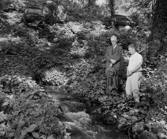 Standing next to the spring where the chief of the Cherokee, Sarcoxie, used to make his headquarters are two Sarcoxie citizens. At left is former Mayor H.B. Boyd, one of the town's oldest residents, and Earl Wright, editor and publisher of the Sarcoxie Record. Published in the News & Leader on May 28, 1950.