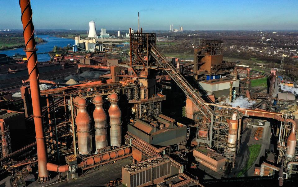 This aerial view shows the blast furnace Schwelgern at the plant of German industrial conglomerate ThyssenKrupp in Duisburg, western Germany, on November 18, 2020. - ThyssenKrupp will broadcast the annual press conference live via audio streaming on November 19, 2020 with presentations by CEO Martina Merz and CFO Klaus Keysberg. (Photo by Ina FASSBENDER / AFP) (Photo by INA FASSBENDER/AFP via Getty Images)