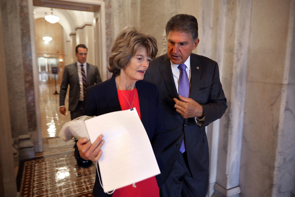 Sens. Lisa Murkowski and Joe Manchin are both seen as swing votes on the Kavanaugh nomination. But only Manchin,&nbsp;a red-state Democrat, is a major target of ad spending. (Photo: Chip Somodevilla via Getty Images)