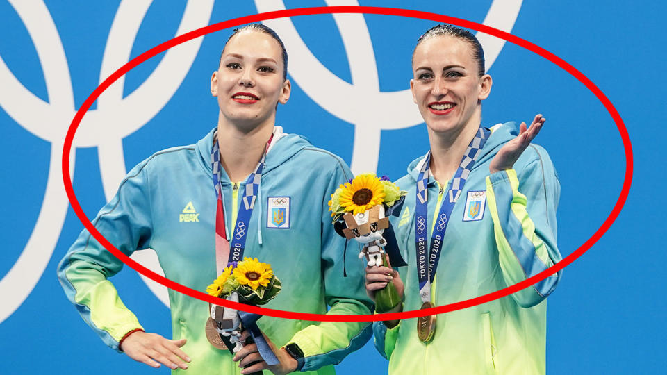 Ukraine's Marta Fiedina and Anastasiya Savchuk looked stunned after being introduced as Russians. Pic: Getty
