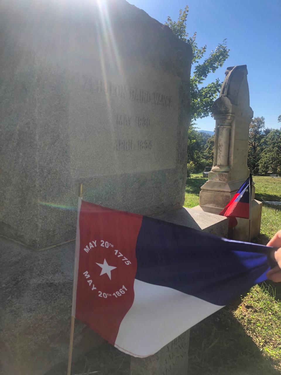 A readers asks who placed Confederate-type flags in Riverside Cemetery recently and why they haven't been removed.