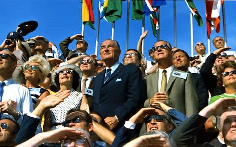 Former president Lyndon Johnson and Vice President Spiro Agnew watch as Apollo 11 is blasted into the sky - Credit: NASA