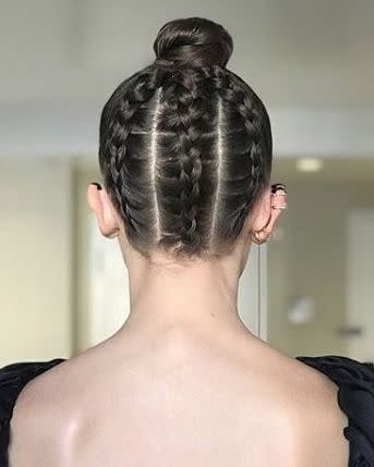 <p>Millie Bobby Brown channelled Dior at this year's Golden Globes with a seriously slick bun that revealed a secret trio of braids at the back. Created by celeb hairstylist Blake Erik, the plaited updo added a sneaky bit of unexpected to the actress' pared back black ensemble.</p>