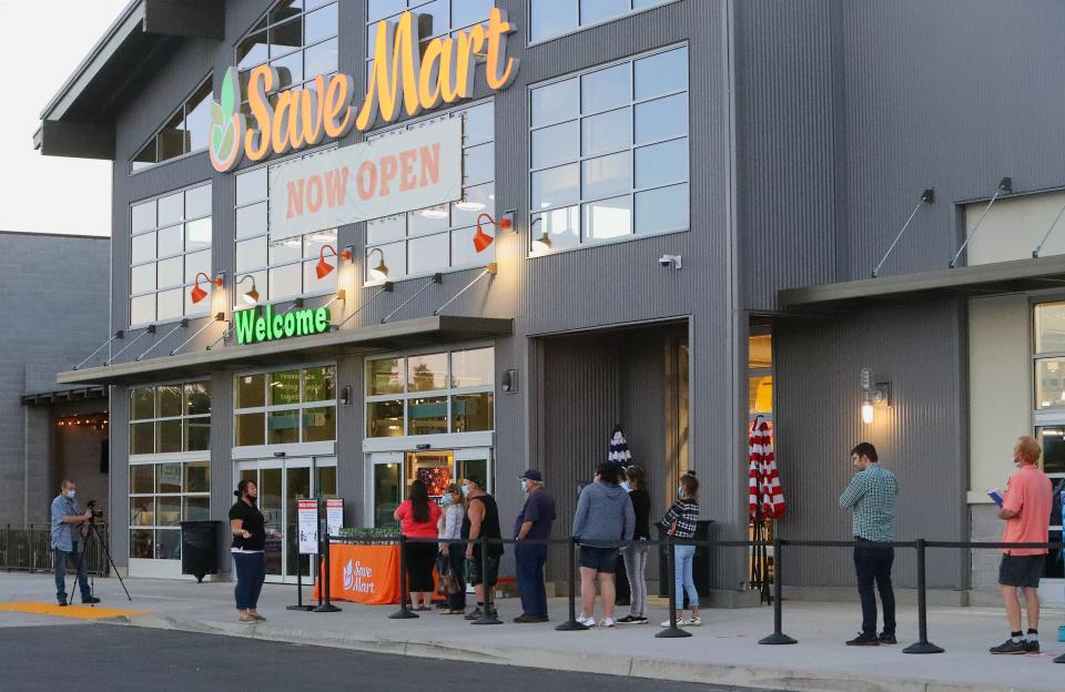 File art - The entrance to Save Mart is seen on its opening day in July 2020.