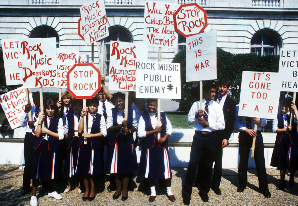 Protestors gather outside the PMRC senate hearing in Washington DC, September 18, 1985. (Credit: Mark Weiss/Getty Images)