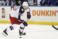 Columbus Blue Jackets right wing Cam Atkinson (13) skates with the puck during the first period of an NHL hockey game, Sunday, Jan. 19, 2020, in New York. (AP Photo/Kathy Willens)