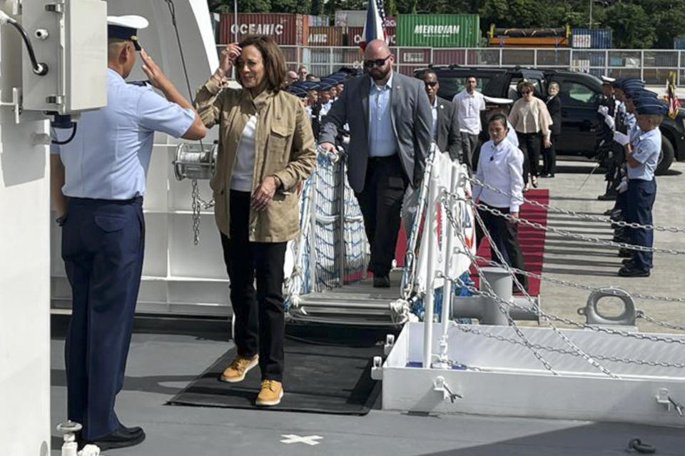 U.S. Vice President Kamala Harris, second from left, arrives for a vessel tour on board the Philippine Coast Guard BRP Teresa Magbanua (MRRV-9701) during her visit to Puerto Princesa, Palawan province, western Philippines on Tuesday, Nov. 22, 2022. Harris visited a western Philippines island province at the edge of the South China Sea on Tuesday to amplify America's support to its treaty ally and underline U.S. interest in freedom of navigation in the disputed waters, where it has repeatedly chastised China for belligerent actions. (AP Photo/Jim Gomez)