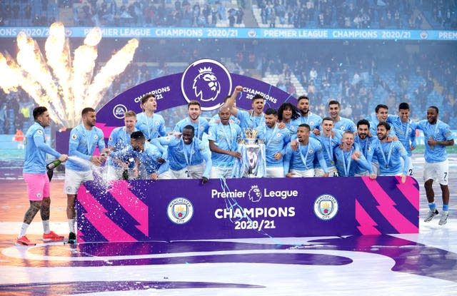 City were presented with the Premier League trophy after finishing 12 points clear at the top of the table