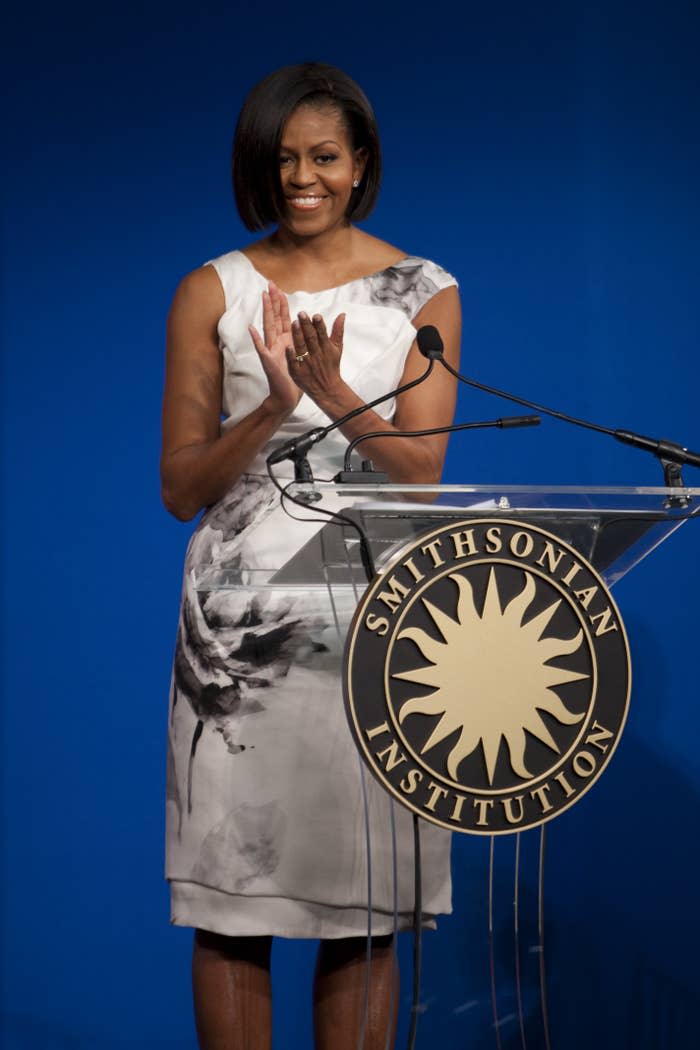 First lady Michelle Obama attends a ceremony to donate the gown that she wore to the 2009 inaugural ball to the Smithsonian's National Museum of American History in Washington