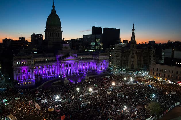 Tens of thousands of Argentinian demonstrators gather outside the Palace of the Argentine National Congress in Buenos Aires. Photo: AAP